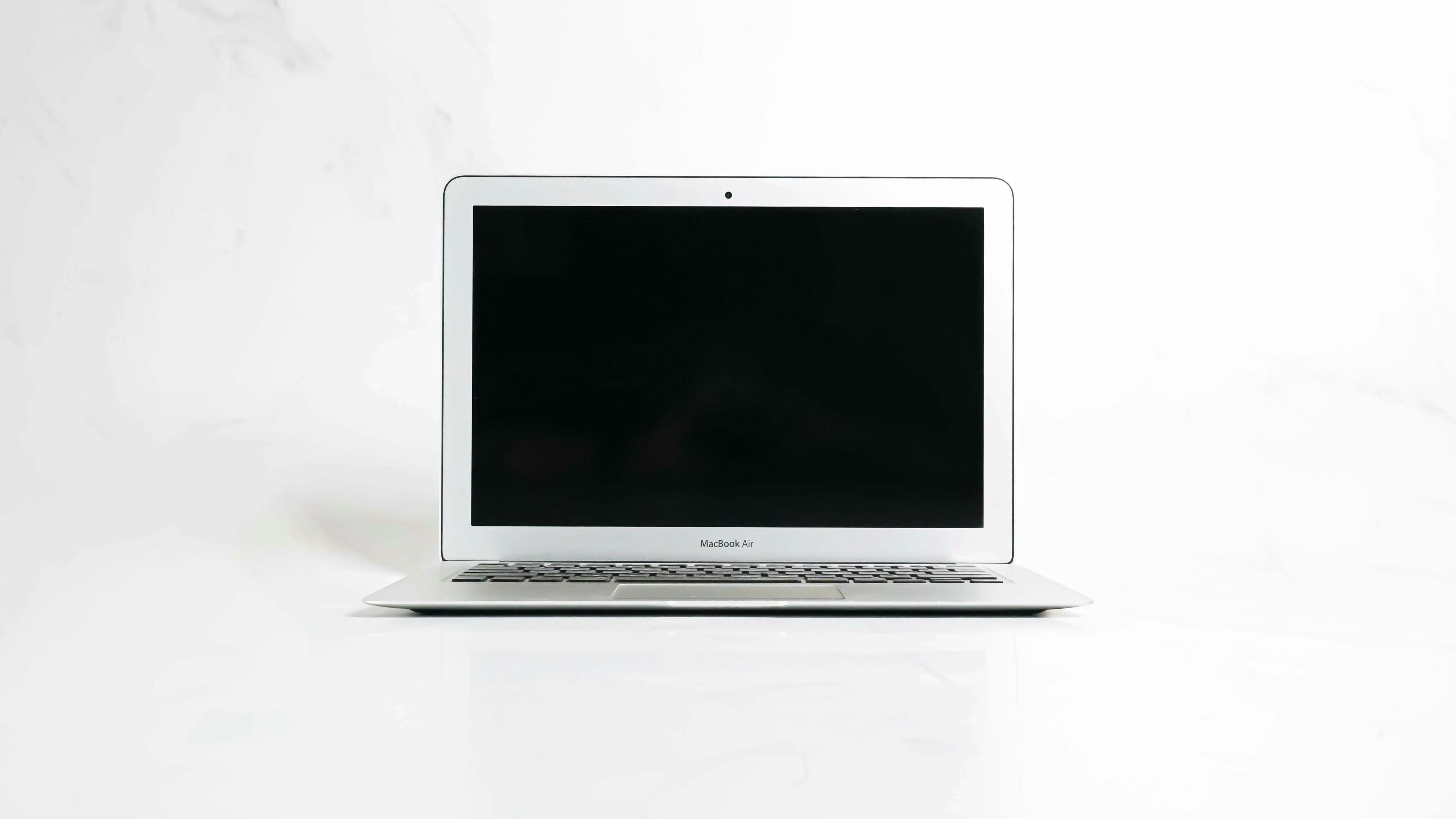 MacBook Black Screen but Power Is On: Causes & Fixes